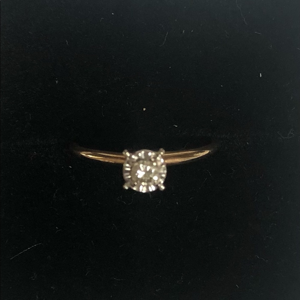 14kt yellow gold 1/10ct diamond promise ring. Size 5 1/2.